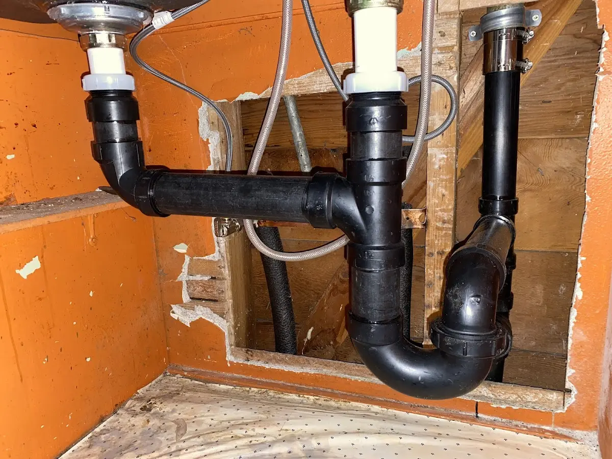 Professional Garbage Disposal Repair equipment and tools on the job in Hoover